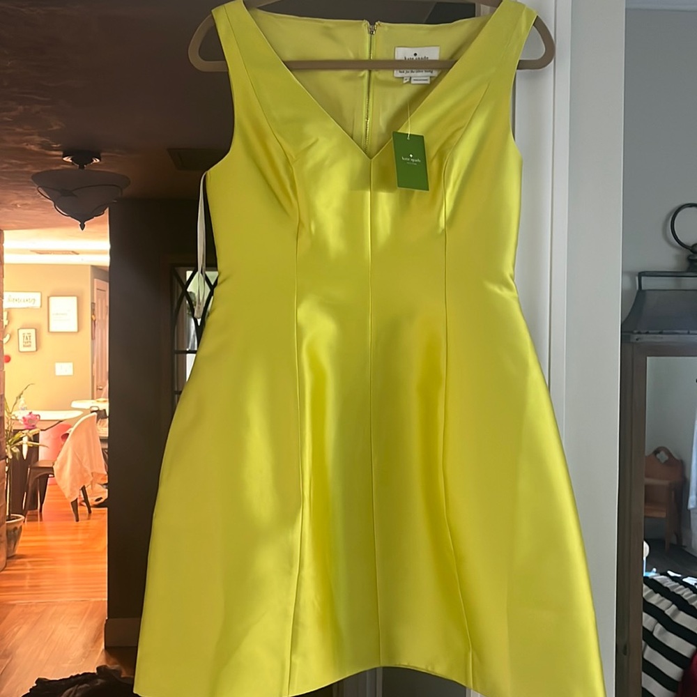 Neon lime green Kate Spade dress. V- neck sleeveless dress.